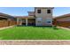 Beautiful backyard featuring well-kept artificial turf, ideal for relaxation and recreation at 9548 E Rainbow Ave, Mesa, AZ 85212