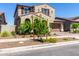Charming two-story home with a desert landscape, two-car garage and tasteful architectural details at 9548 E Rainbow Ave, Mesa, AZ 85212