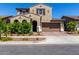Charming two-story home with a desert landscape, two-car garage and tasteful architectural details at 9548 E Rainbow Ave, Mesa, AZ 85212