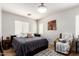 Cozy bedroom with neutral tones, soft textures, and comfortable furniture at 10239 W Via Del Sol -- # 400, Peoria, AZ 85383