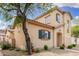 Two-story home with desert landscaping, neutral stucco, tile roof, and decorative shutters at 10239 W Via Del Sol -- # 400, Peoria, AZ 85383