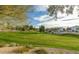 A grassy park with lush landscaping provides a serene community setting at 10239 W Via Del Sol -- # 400, Peoria, AZ 85383