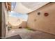 The outdoor patio offers hardscape pavers, stucco walls and a custom sunshade for privacy at 10239 W Via Del Sol -- # 400, Peoria, AZ 85383