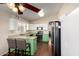 Bright kitchen featuring granite countertops, stainless steel appliances, and a stylish island with seating at 1279 N Blackstone Dr, Chandler, AZ 85224