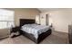 Bright main bedroom features neutral tones and adjoining access to the main bathroom at 1279 N Blackstone Dr, Chandler, AZ 85224