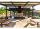Outdoor area showcasing an ornamental fireplace and picnic tables at 1330 E Monte Way, Phoenix, AZ 85042