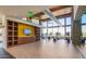 The workout facility features floor to ceiling windows and modern equipment at 1330 E Monte Way, Phoenix, AZ 85042