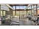 The gym boasts new equipment and floor-to-ceiling windows with beautiful mountain views at 1330 E Monte Way, Phoenix, AZ 85042