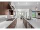 Modern kitchen with stainless appliances, gas range, and quartz countertops perfect for cooking and entertaining at 1330 E Monte Way, Phoenix, AZ 85042