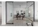 Stylish home office space with modern glass doors, perfect for working from home at 1330 E Monte Way, Phoenix, AZ 85042