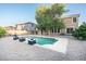 Beautiful backyard with a refreshing pool, perfect for relaxation and outdoor entertainment at 15028 W Columbine Dr, Surprise, AZ 85379