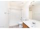 Bright bathroom featuring a shower and tub combo and a vanity sink at 15028 W Columbine Dr, Surprise, AZ 85379