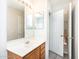 This bathroom features a vanity sink and a doorway leading to the hallway at 15028 W Columbine Dr, Surprise, AZ 85379