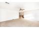 Another view of a bright bedroom that includes the staircase to the second floor at 15028 W Columbine Dr, Surprise, AZ 85379