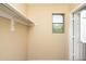 An inside view of a walk-in closet with shelving at 15028 W Columbine Dr, Surprise, AZ 85379