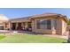 Well maintained yard showcasing a pool and outdoor living at 15288 W Redfield Rd, Surprise, AZ 85379