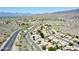 Aerial view of the community showing the beautiful desert landscape and scenic mountain views at 15550 S 5Th Ave # 130, Phoenix, AZ 85045