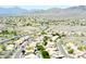 An aerial view of the neighborhood surrounded by the desert landscape at 15550 S 5Th Ave # 130, Phoenix, AZ 85045