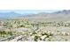 A scenic aerial view of the community showing homes and the desert landscape at 15550 S 5Th Ave # 130, Phoenix, AZ 85045