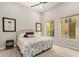 Bedroom with ceiling fan, natural light, and neutral-colored walls at 15550 S 5Th Ave # 130, Phoenix, AZ 85045