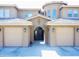 Charming townhome featuring a well-maintained facade and a two-car garage at 15550 S 5Th Ave # 130, Phoenix, AZ 85045