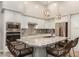 Bright kitchen featuring stainless appliances, granite countertops, and a kitchen island at 15550 S 5Th Ave # 130, Phoenix, AZ 85045