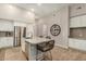 Kitchen with stainless steel appliances, a large island, and hardwood floors at 15550 S 5Th Ave # 130, Phoenix, AZ 85045
