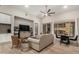 Modern living room includes an entertainment center and large windows, creating a cozy atmosphere at 15550 S 5Th Ave # 130, Phoenix, AZ 85045