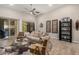 Comfortable living room boasting stylish furnishings and ample natural light from the expansive windows at 15550 S 5Th Ave # 130, Phoenix, AZ 85045