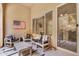 Inviting outdoor patio area with comfortable seating and decorative touches at 15550 S 5Th Ave # 130, Phoenix, AZ 85045