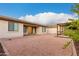 Spacious backyard showcasing a well-maintained landscape, a patio, and a pergola at 16183 W Devonshire Ave, Goodyear, AZ 85395