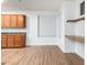 Bright space near kitchen, with custom wooden built-in shelves at 16183 W Devonshire Ave, Goodyear, AZ 85395