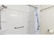Bright, clean bathroom with tiled shower and convenient grab bar at 1633 E Lakeside Dr # 98, Gilbert, AZ 85234
