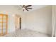 Bedroom with light walls, marble floors and access to closet and bathroom at 1633 E Lakeside Dr # 98, Gilbert, AZ 85234