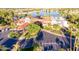Elegant clubhouse featuring a grand entrance, beautiful landscaping, and ample parking at 1633 E Lakeside Dr # 98, Gilbert, AZ 85234