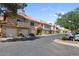 Charming townhome featuring a private garage, well-maintained landscaping, and a welcoming curb appeal at 1633 E Lakeside Dr # 98, Gilbert, AZ 85234