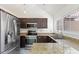 Open kitchen design with stainless steel appliances and granite countertops at 1633 E Lakeside Dr # 98, Gilbert, AZ 85234