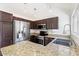 Open kitchen design with stainless steel appliances and granite countertops at 1633 E Lakeside Dr # 98, Gilbert, AZ 85234