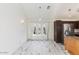 Bright living room with marble floors, tall ceilings and ample natural light at 1633 E Lakeside Dr # 98, Gilbert, AZ 85234