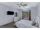 Serene main bedroom featuring soft gray walls, neutral carpet, ample natural light, and contemporary furnishings at 1650 S Crismon Rd # 86, Mesa, AZ 85209