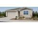 Charming single-story home with a two-car garage and well-manicured front yard, offering curb appeal at 16689 W Hackamore Dr, Surprise, AZ 85387