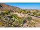 Home featuring a pool, covered pavilion, fire pit and desert landscape at 16716 S 32Nd Ln, Phoenix, AZ 85045