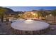 Outdoor living featuring desert landscape, fire pit, and pool with covered pavilion at 16716 S 32Nd Ln, Phoenix, AZ 85045