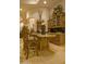 An inviting kitchen features an island with bar seating and custom cabinetry at 16716 S 32Nd Ln, Phoenix, AZ 85045