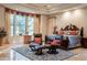 Spacious bedroom with large window, seating area, and a luxurious bed at 16716 S 32Nd Ln, Phoenix, AZ 85045