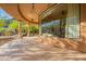 A covered patio has views of the yard and surrounding landscape at 16716 S 32Nd Ln, Phoenix, AZ 85045
