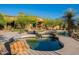 Inviting backyard pool and spa area featuring desert landscaping and a stunning architecture at 16716 S 32Nd Ln, Phoenix, AZ 85045