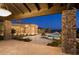 Stunning backyard oasis featuring a luxurious pool, elegant paving, and a covered patio for relaxation at 16716 S 32Nd Ln, Phoenix, AZ 85045