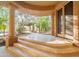 Inviting front porch with stone steps leading to a covered entryway and well-maintained landscaping at 16716 S 32Nd Ln, Phoenix, AZ 85045