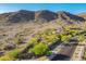 Desert property backed by scenic mountain and mature landscaping at 16716 S 32Nd Ln, Phoenix, AZ 85045